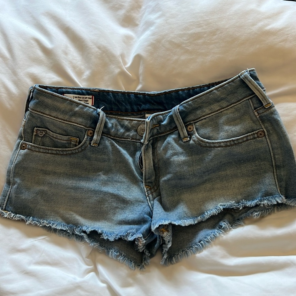 True religion low rise cut off shorts size 25 light wash